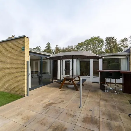 Holiday home Astounding With Patio *